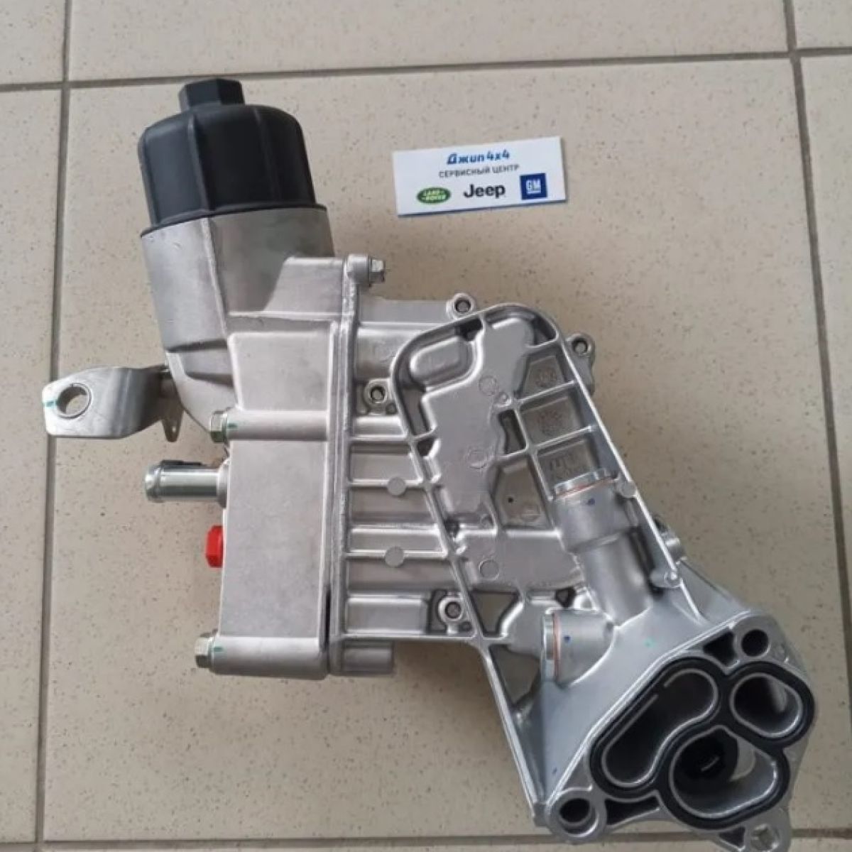 Радиатор масляный-теплообменник Jeep Grand Cherokee WK2 V3.0CRD 68211440AB
