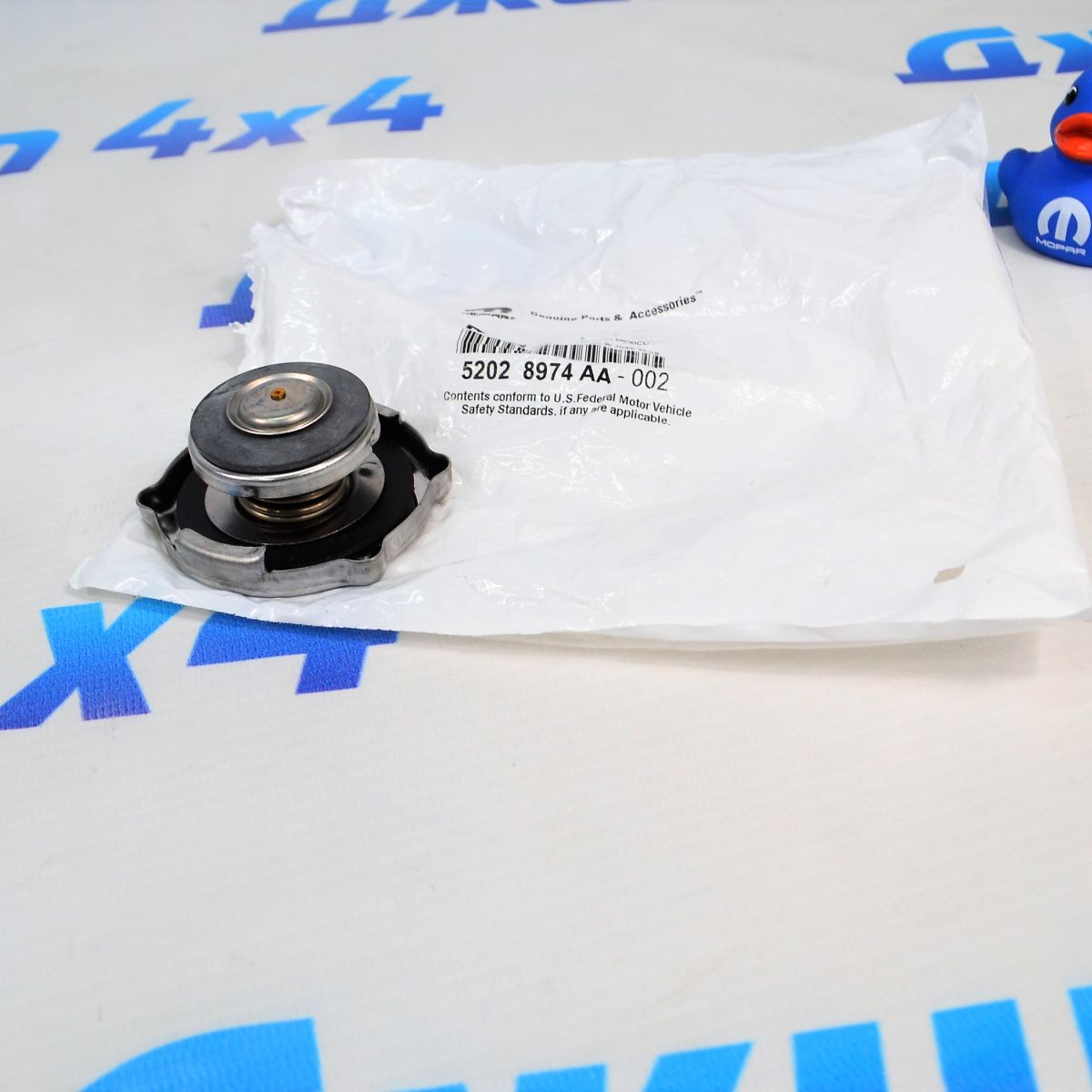 Крышка расширительного бачка Dodge Challenger/Dodge Charger (18PSI) 52028974AA