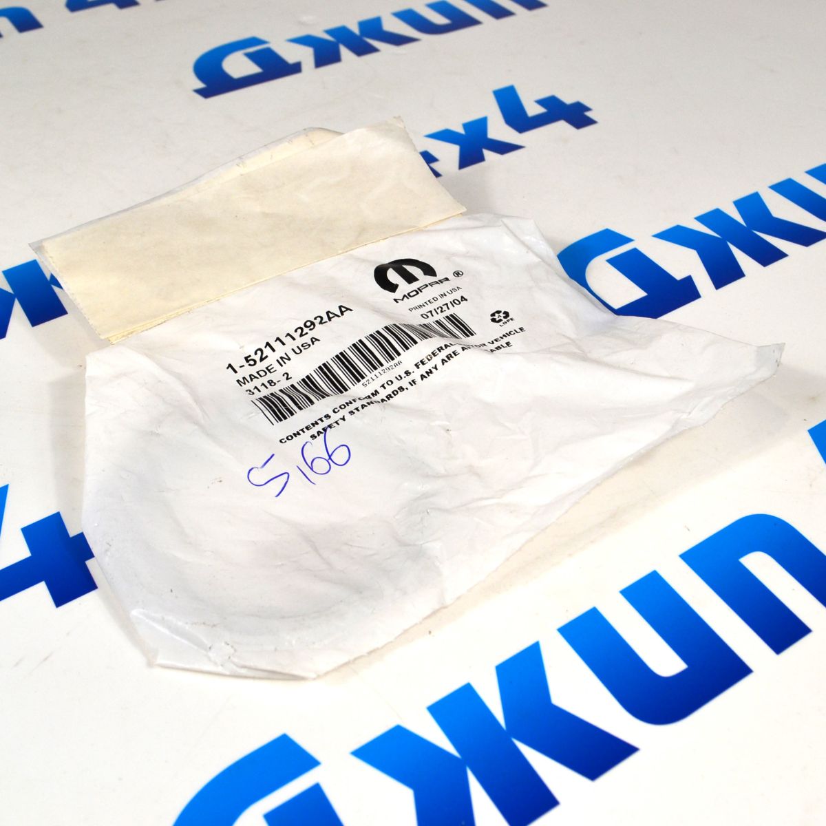 Шайба регулировочная хвостовика переднего дифференциала Jeep Grand Cherokee 52111292AA