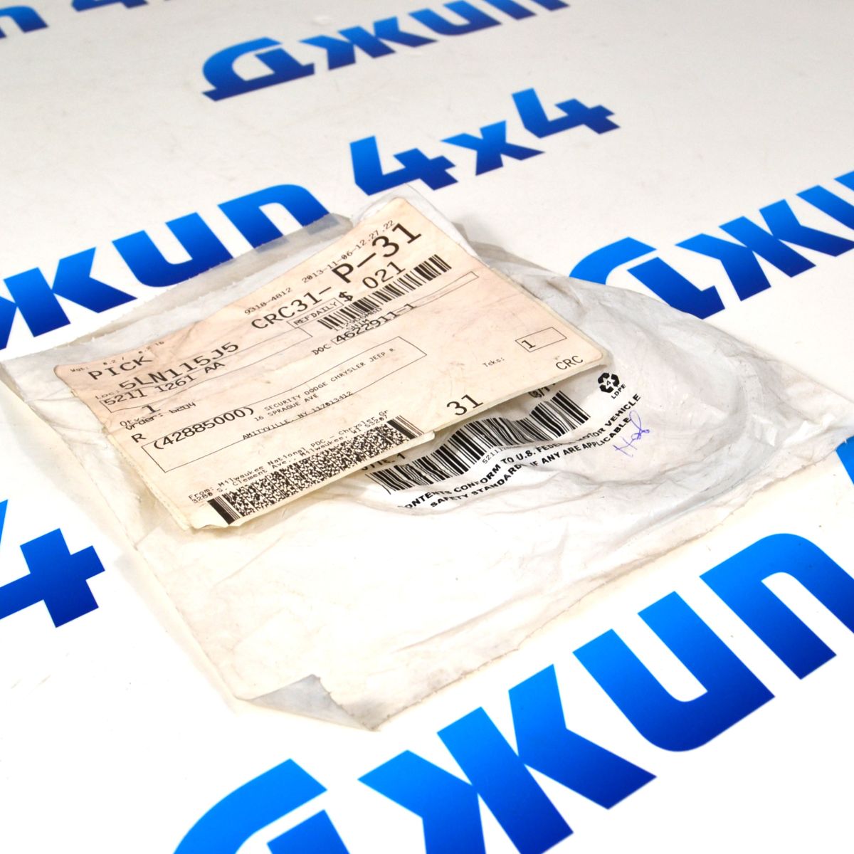 Шайба регулировочная хвостовика переднего дифференциала Jeep Grand Cherokee 52111261AA