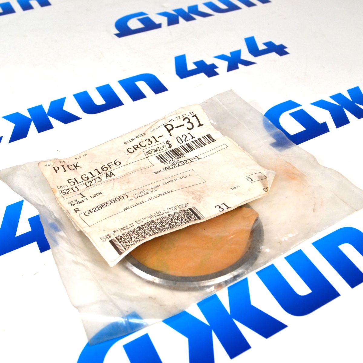 Шайба регулировочная хвостовика переднего дифференциала Jeep Grand Cherokee 52111273AA