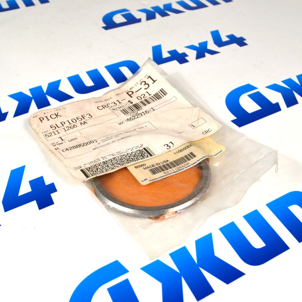 Шайба регулировочная хвостовика переднего дифференциала Jeep Grand Cherokee 52111266AA