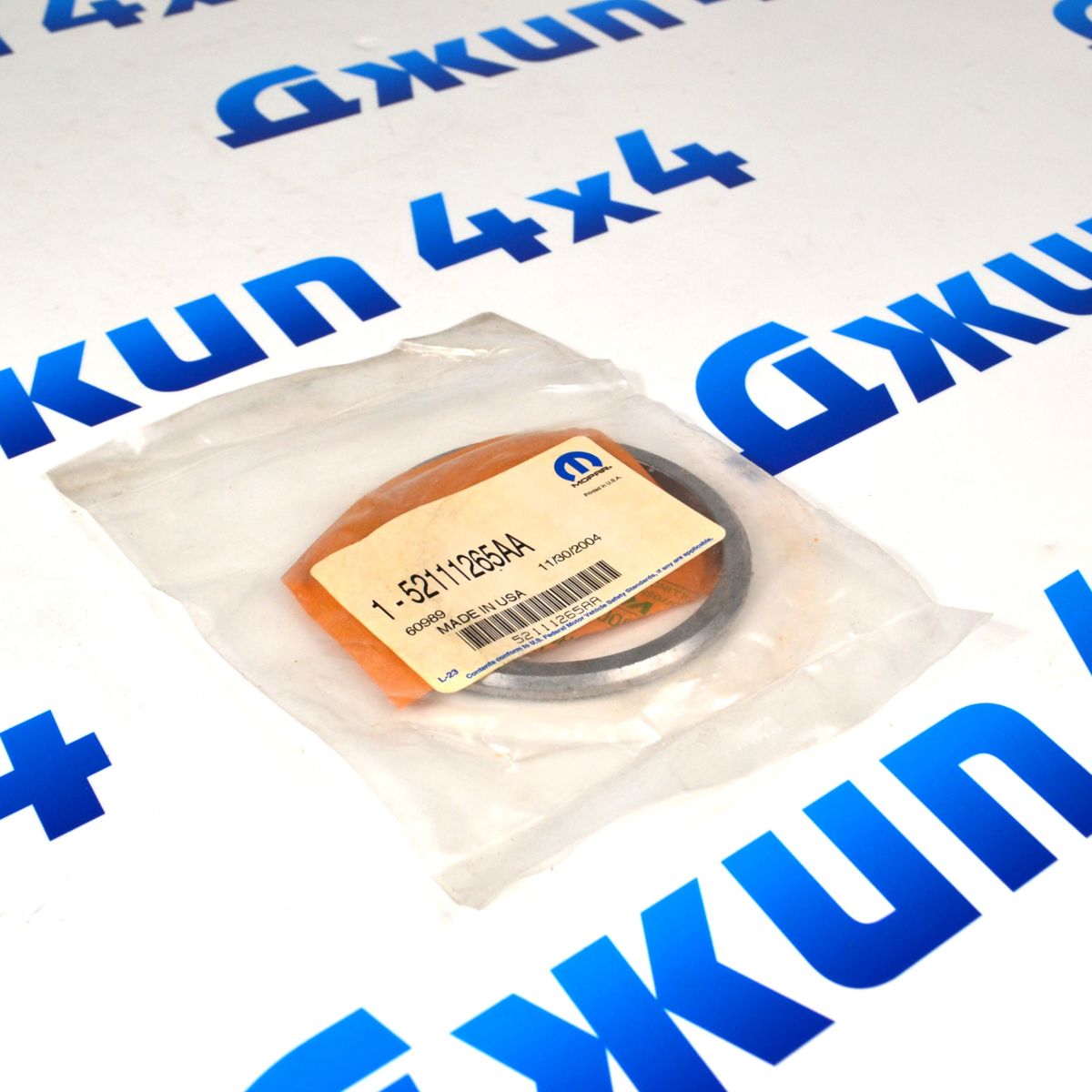 Шайба регулировочная хвостовика переднего дифференциала Jeep Grand Cherokee 52111265AA